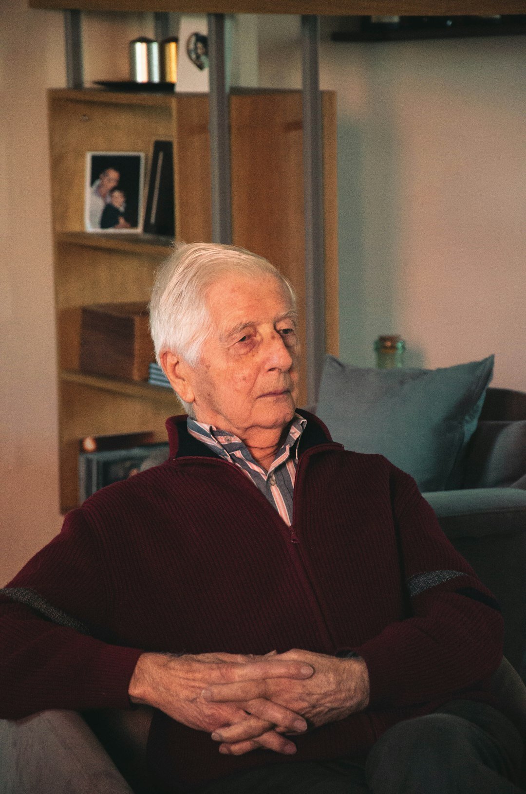 elderly man arm circles at home