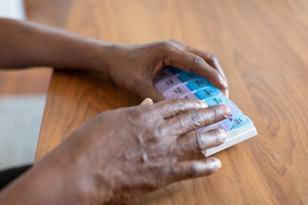 elderly person with calculator
