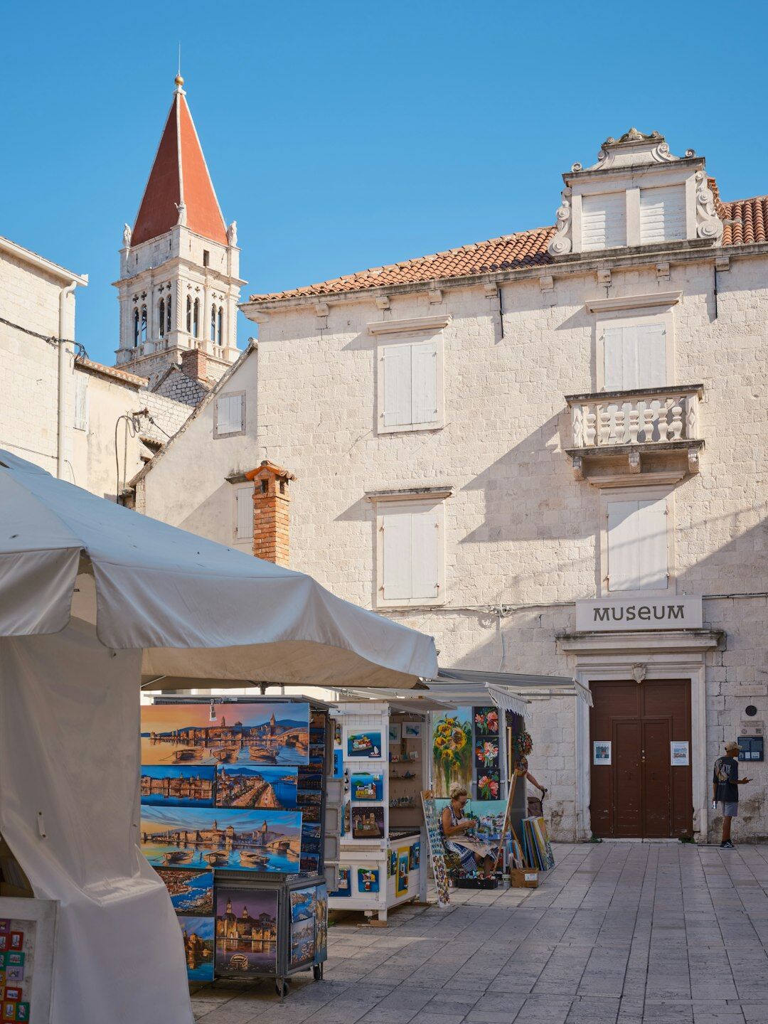 Seniors visiting a museum exhibit together in Croatia